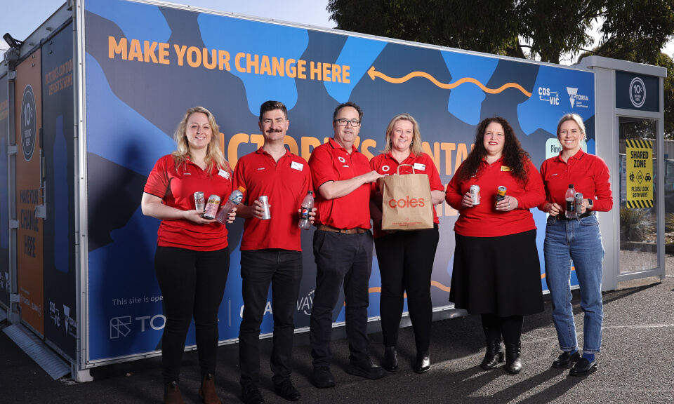 container deposit scheme team in front of truck